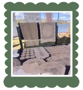 Hanging crochet tableclots from a flea market