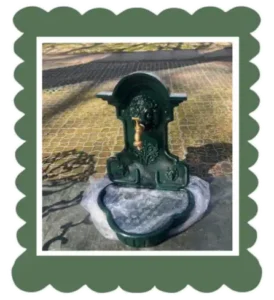 Water fountain wrought iron green